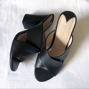 Leith black leather cross strap heels